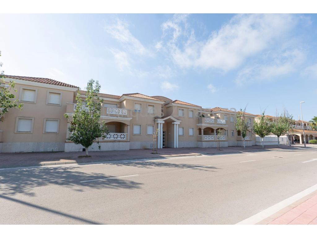 Riumar is a small residential development with just over 1,000 homes, located directly on the beach and surrounded by the Ebro Delta Natural Park. It offers 18 restaurants, 5 beach bars, a SPAR supermarket, and a small river marina.This ground-floor apartment was built in 2003 and is located directly on the seafront promenade. The property has a built area of 64 m² and is distributed into an entrance hall, an open-plan kitchen with living-dining room, two bedrooms, and a full bathroom with bathtub. The living-dining room provides direct access to the balcony, an ideal space to enjoy the surroundings and the proximity to the sea.The apartment is ready to move into. In addition, it benefits from a communal swimming pool and a parking space, providing extra comfort and added value to the property.An excellent opportunity for those seeking a practical and well-located home by the beach, whether as a primary residence, holiday home, or investment.* The stated price does not include the costs and taxes arising from the transfer of ownership, such as notary, land registry, and administrative fees, nor any applicable taxes (Property Transfer Tax, Value Added Tax, or Stamp Duty), all of which shall be borne entirely by the purchaser in accordance with current legislation.Real estate agency fees are included in the advertised sale price.To determine and consult the applicable tax regime, it is recommended to visit the website of the Catalan Tax Agency: https://atc.gencat.cat/ca/tributsThe information contained in this advertisement is provided for informational and guidance purposes only and does not constitute a binding offer or contract under any circumstances. Finques Zaragoza Immobiliaria Delta de l’Ebre, S.L. reserves the right to modify, update, or correct the contents of this advertisement at any time without prior notice.